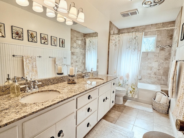 1425 W Main St, Vernal, UT 84078 - full bathroom featuring shower / bath combo, double vanity, tile patterned flooring, and a wainscoted wall