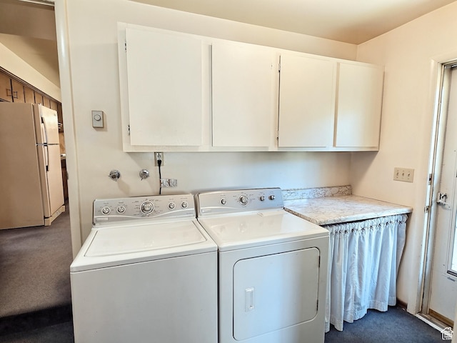1425 W Main St, Vernal, UT 84078 - washroom featuring separate washer and dryer, cabinet space, and dark carpet