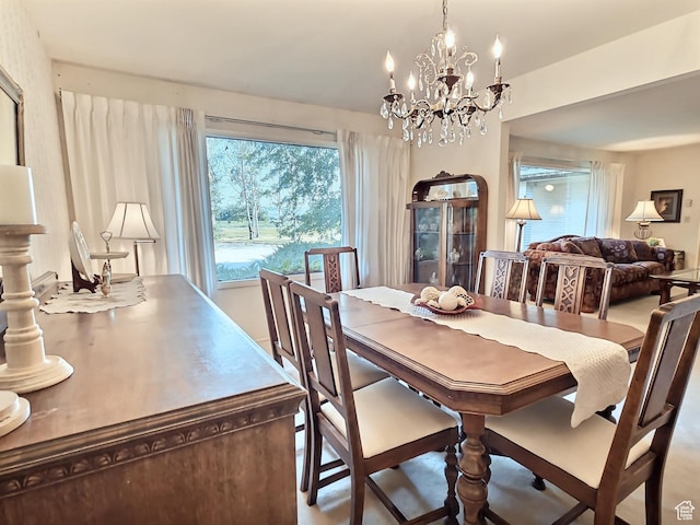 1425 W Main St, Vernal, UT 84078 - dining space with plenty of natural light and a chandelier