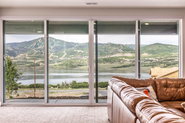 11795 N Star Gazer Cir, Hideout, UT 84036 - interior space featuring plenty of natural light and a water and mountain view