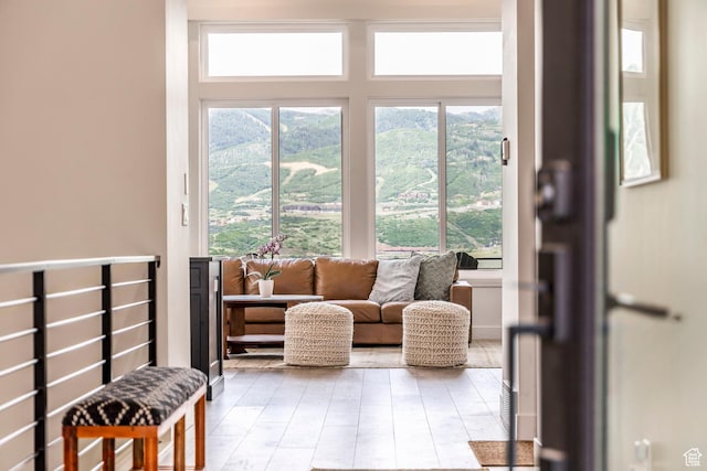 11795 N Star Gazer Cir, Hideout, UT 84036 - living area with plenty of natural light and light wood-type flooring