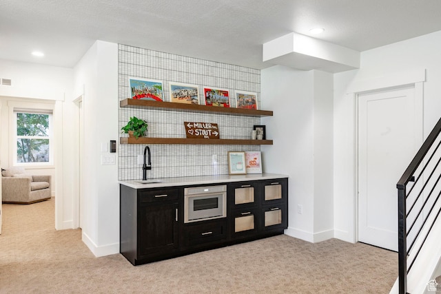 11795 N Star Gazer Cir, Hideout, UT 84036 - indoor bar featuring light colored carpet, stairs, wall oven, and recessed lighting