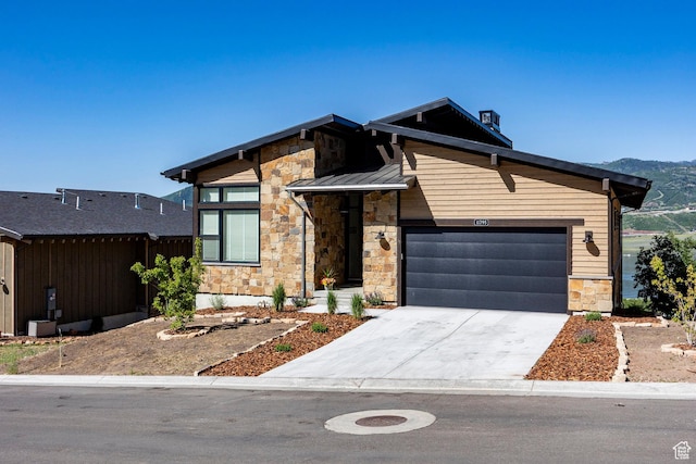 11795 N Star Gazer Cir, Hideout, UT 84036 - view of front of house with stone siding, an attached garage, and concrete driveway