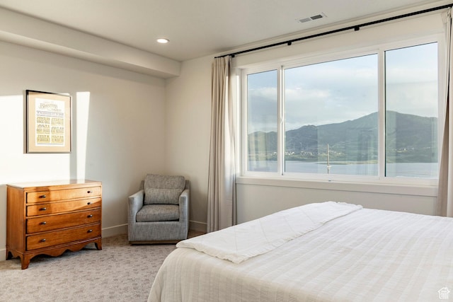 11795 N Star Gazer Cir, Hideout, UT 84036 - bedroom with light carpet, recessed lighting, and a mountain view