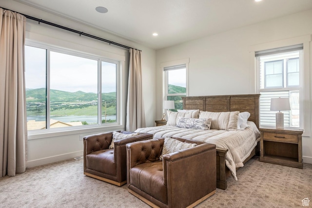 11795 N Star Gazer Cir, Hideout, UT 84036 - bedroom featuring multiple windows, recessed lighting, and light carpet