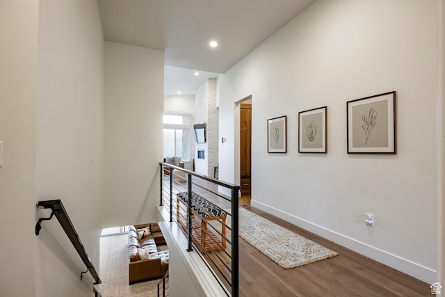 11795 N Star Gazer Cir, Hideout, UT 84036 - hallway with an upstairs landing, wood finished floors, and recessed lighting