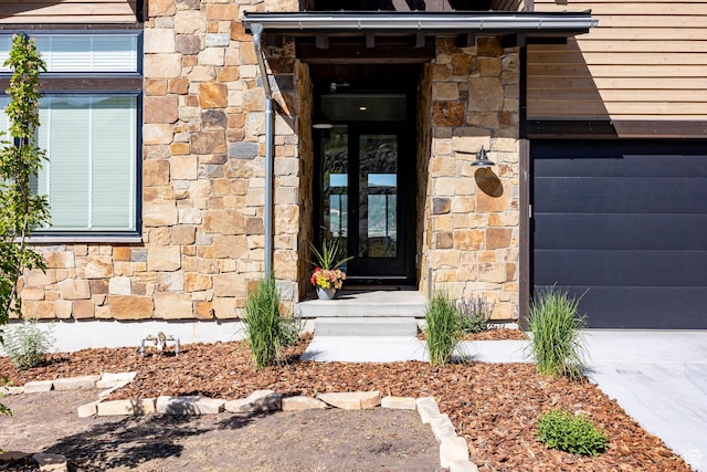 11795 N Star Gazer Cir, Hideout, UT 84036 - doorway to property featuring stone siding and a garage