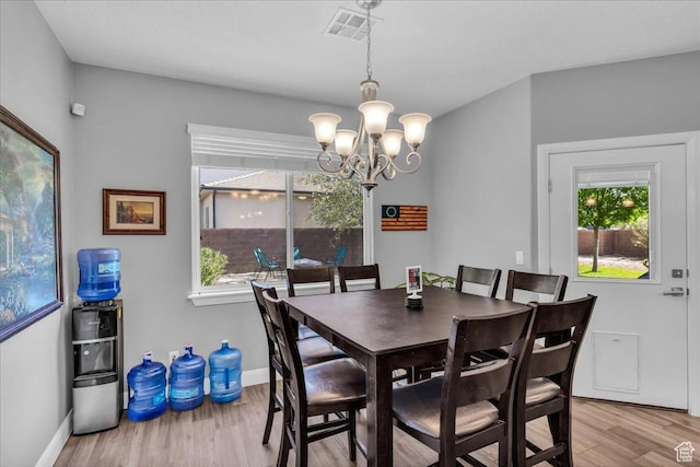 2644 E 3800 S, St George, UT 84790 - dining room with wood finished floors and a chandelier