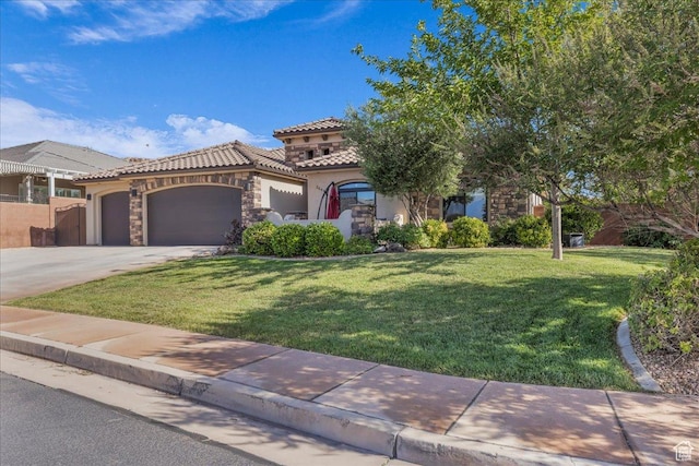2644 E 3800 S, St George, UT 84790 - mediterranean / spanish house with stucco siding, a tiled roof, a garage, concrete driveway, and stone siding