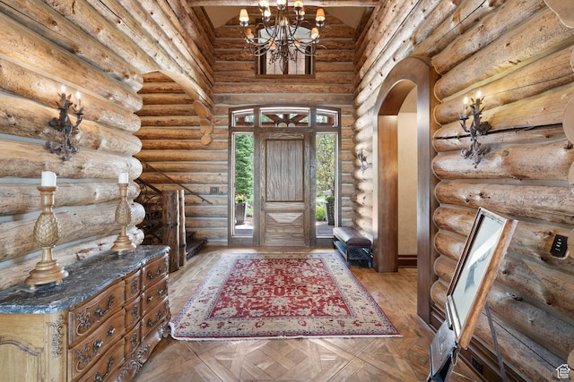 1943 N Wolf Creek Ranch Rd Unit 12, Heber City, UT 84032 - foyer with a chandelier and arched walkways