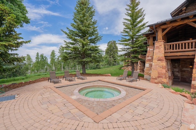 1943 N Wolf Creek Ranch Rd Unit 12, Heber City, UT 84032 - view of pool featuring an in-ground hot tub and a patio