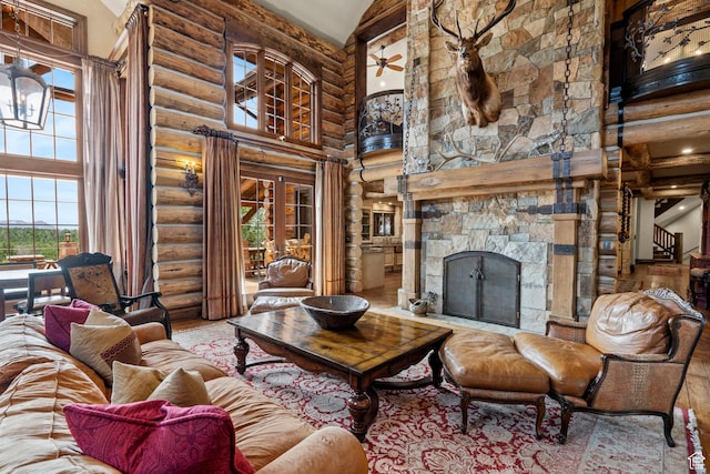 1943 N Wolf Creek Ranch Rd Unit 12, Heber City, UT 84032 - living area with high vaulted ceiling, rustic walls, and a fireplace