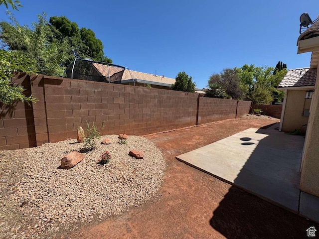 319 E 710 S, Ivins, UT 84738 - fenced backyard featuring a patio area