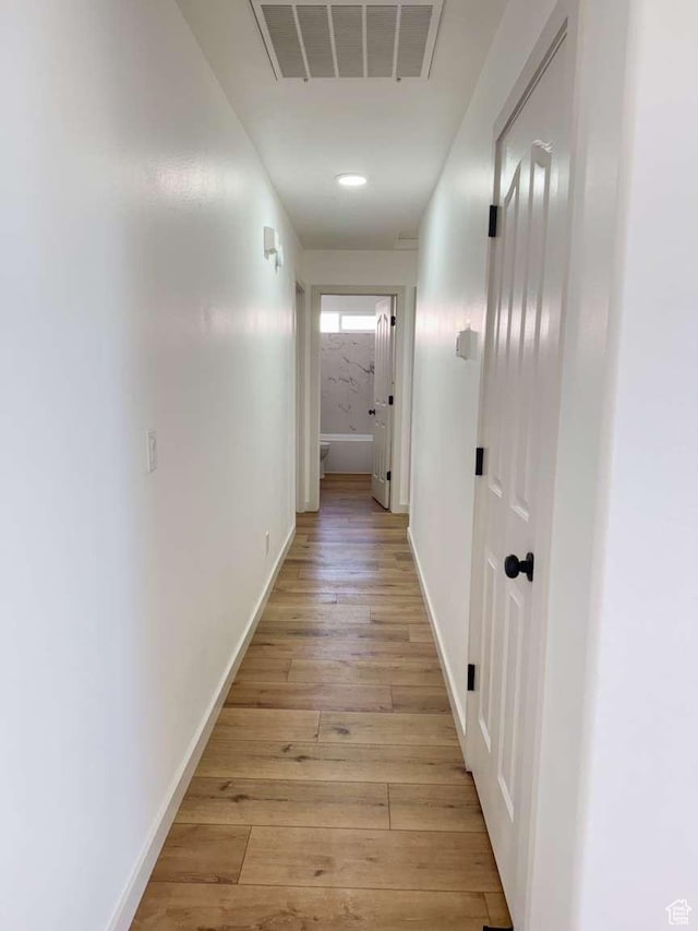 319 E 710 S, Ivins, UT 84738 - hall featuring light wood-style floors and baseboards