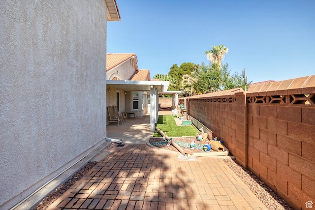 3430 Red Butte Dr, Santa Clara, UT 84765 - deck featuring a patio and a fenced backyard