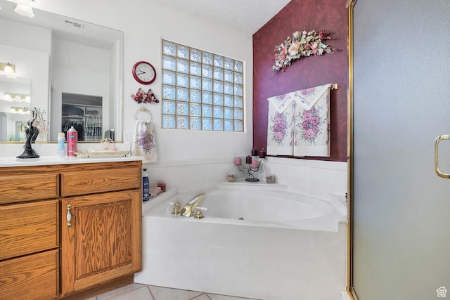 3430 Red Butte Dr, Santa Clara, UT 84765 - bathroom with vanity, a garden tub, a stall shower, tile patterned floors, and a textured ceiling