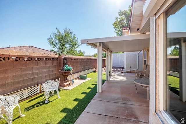 3430 Red Butte Dr, Santa Clara, UT 84765 - fenced backyard featuring a patio area
