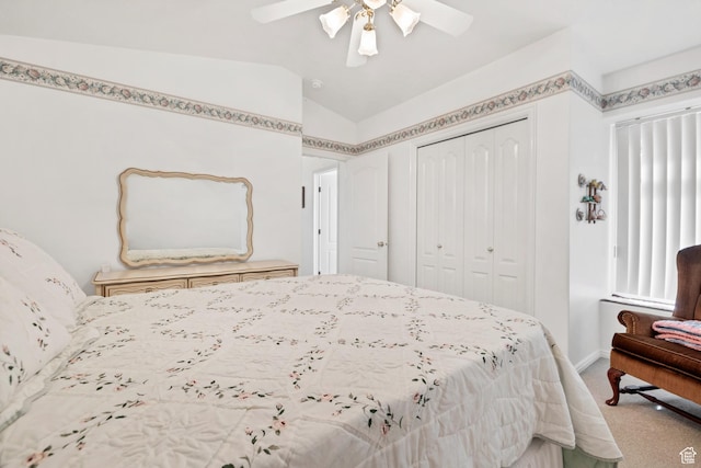 3430 Red Butte Dr, Santa Clara, UT 84765 - bedroom with light carpet, vaulted ceiling, a closet, and a ceiling fan