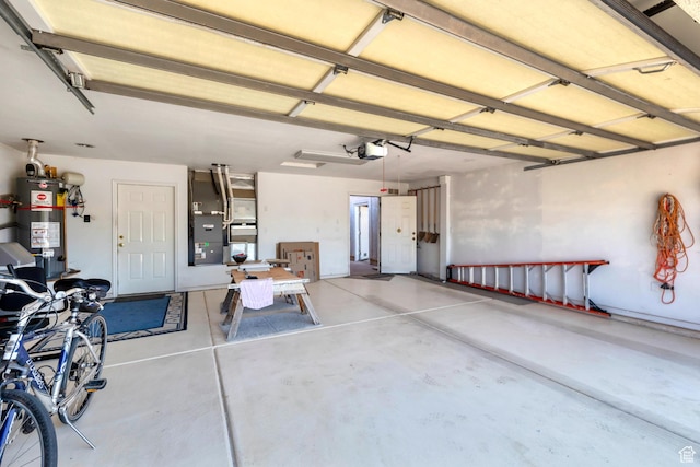 3430 Red Butte Dr, Santa Clara, UT 84765 - garage with a garage door opener and water heater