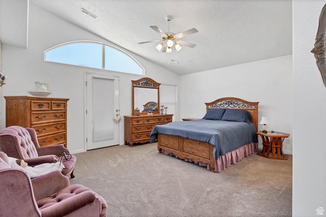 3430 Red Butte Dr, Santa Clara, UT 84765 - carpeted bedroom with a textured ceiling, vaulted ceiling, and a ceiling fan