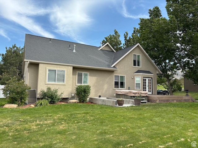 332 W Hillside S, Saratoga Springs, UT 84045 - back of property with stucco siding, a lawn, and roof with shingles