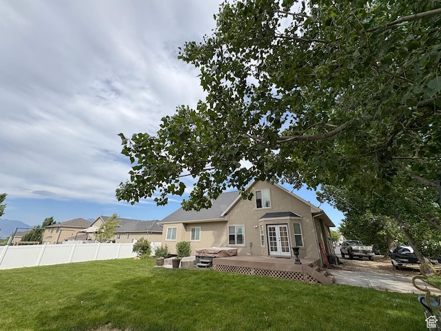 332 W Hillside S, Saratoga Springs, UT 84045 - back of house featuring a wooden deck, stucco siding, and french doors