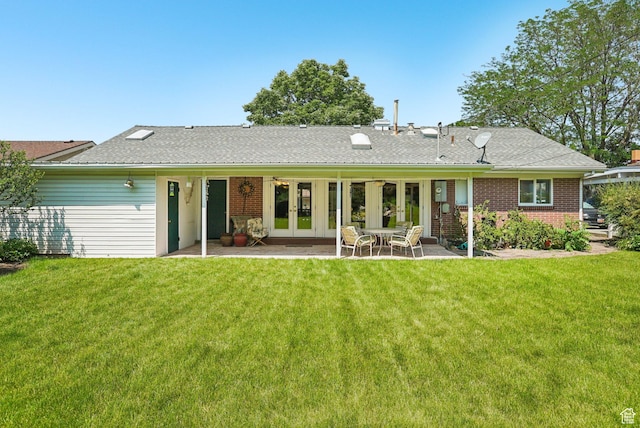4199 S Monarch Way, Salt Lake City, UT 84124 - back of house featuring french doors, a yard, a patio, and brick siding