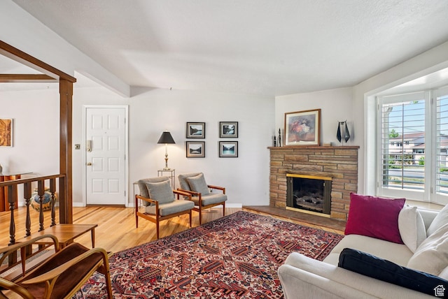 4199 S Monarch Way, Salt Lake City, UT 84124 - living room with light wood-type flooring and a stone fireplace