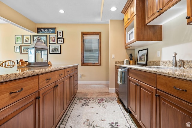 14599 S Chaumont Ct, Draper, UT 84020 - kitchen featuring brown cabinets, stainless steel dishwasher, recessed lighting, and light stone counters