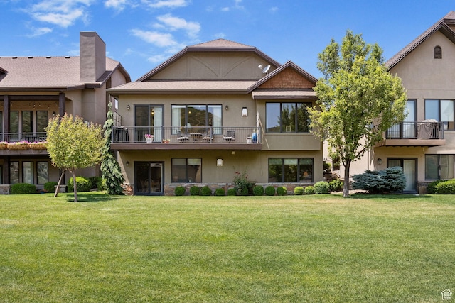14599 S Chaumont Ct, Draper, UT 84020 - back of house featuring stucco siding, a lawn, and a chimney