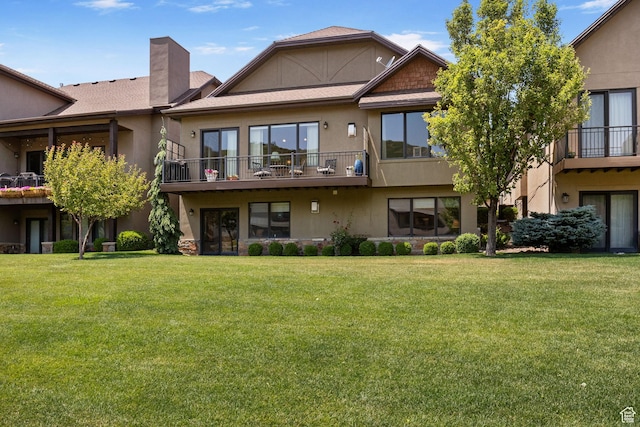 14599 S Chaumont Ct, Draper, UT 84020 - rear view of property with stucco siding, a chimney, and a yard