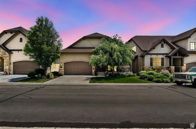 14599 S Chaumont Ct, Draper, UT 84020 - view of front of house with stucco siding, driveway, and a garage