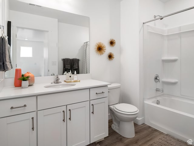 409 S 1110 W Unit 223, American Fork, UT 84003 - full bathroom featuring wood finished floors, vanity, and shower / washtub combination