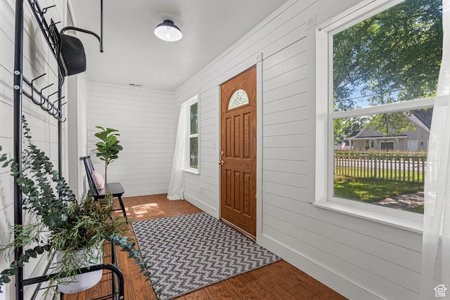 727 S Main St, Mapleton, UT 84664 - foyer featuring wooden walls and wood finished floors