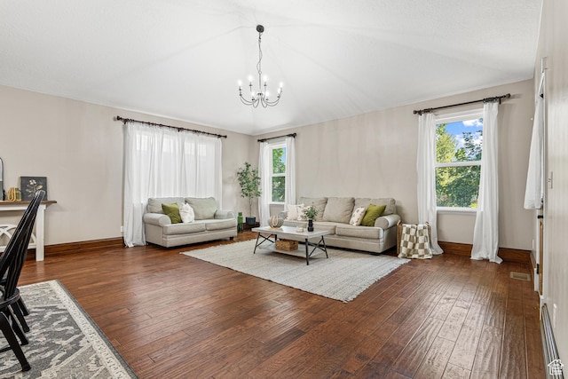 727 S Main St, Mapleton, UT 84664 - living room featuring hardwood / wood-style floors, a chandelier, and baseboard heating