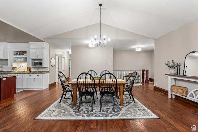 727 S Main St, Mapleton, UT 84664 - dining room with vaulted ceiling, a chandelier, and dark wood-style floors