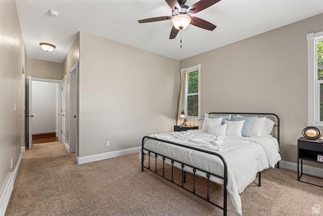727 S Main St, Mapleton, UT 84664 - carpeted bedroom featuring baseboards and ceiling fan