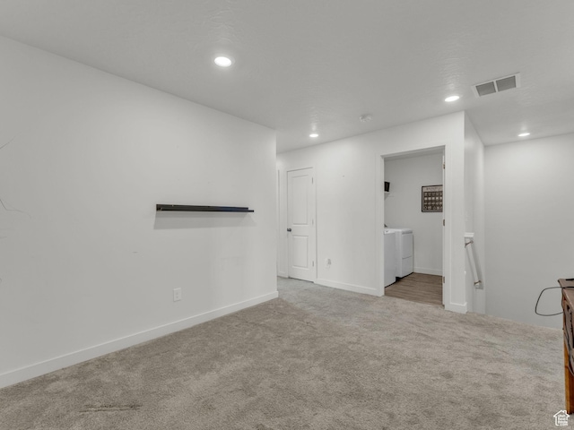 937 W Purpledisk Ct, Saratoga Springs, UT 84045 - carpeted empty room featuring washing machine and clothes dryer and recessed lighting