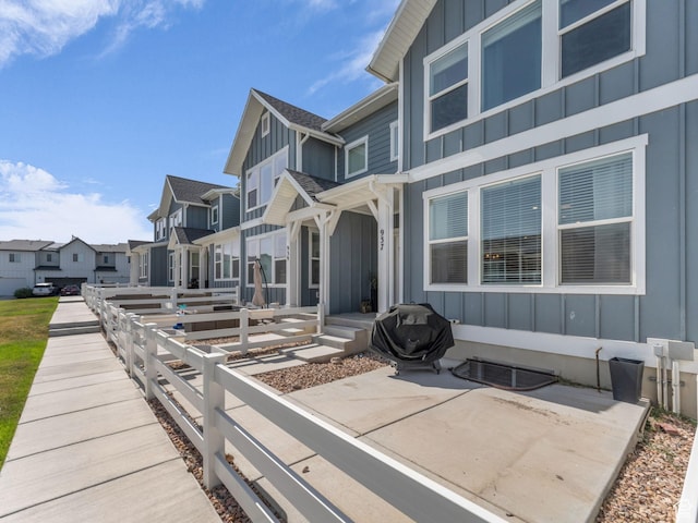 937 W Purpledisk Ct, Saratoga Springs, UT 84045 - exterior space with board and batten siding, a residential view, and a patio