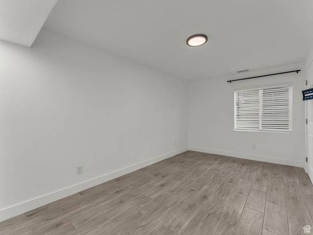937 W Purpledisk Ct, Saratoga Springs, UT 84045 - unfurnished room with light wood-type flooring and baseboards