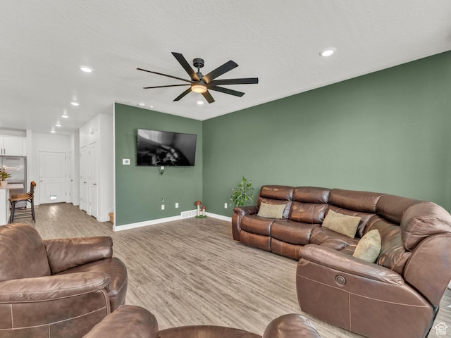 937 W Purpledisk Ct, Saratoga Springs, UT 84045 - living room with a ceiling fan, recessed lighting, and wood finished floors