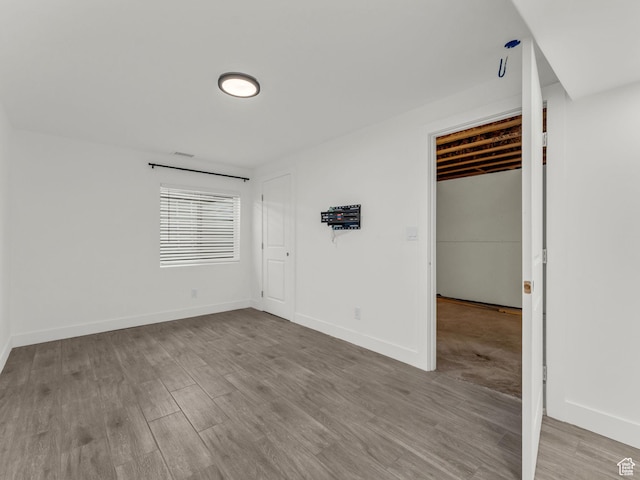 937 W Purpledisk Ct, Saratoga Springs, UT 84045 - empty room featuring wood finished floors and baseboards