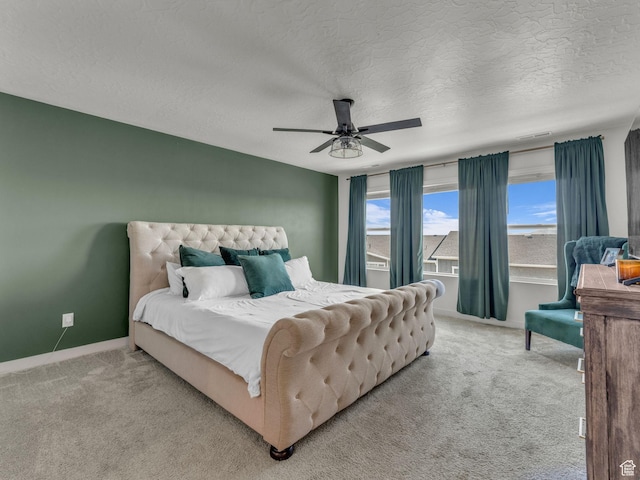 937 W Purpledisk Ct, Saratoga Springs, UT 84045 - bedroom with light colored carpet, a ceiling fan, and a textured ceiling