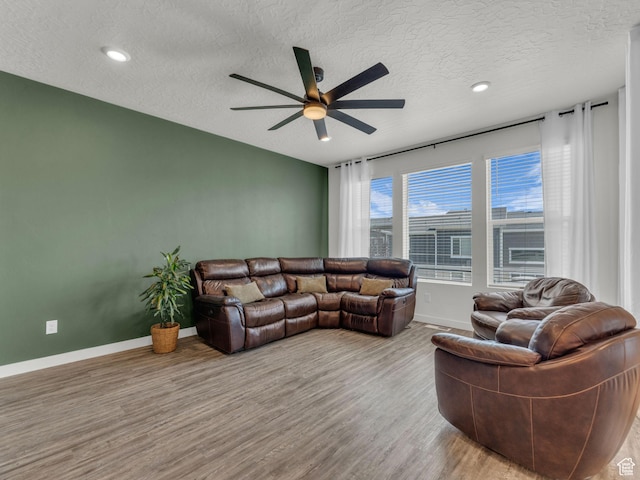 937 W Purpledisk Ct, Saratoga Springs, UT 84045 - living area featuring a ceiling fan, wood finished floors, a textured ceiling, and recessed lighting