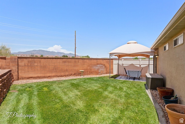 1360 E Telegraph St Unit 18, Washington, UT 84780 - fenced backyard featuring a mountain view