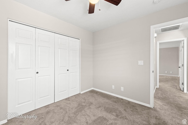 1360 E Telegraph St Unit 18, Washington, UT 84780 - unfurnished bedroom featuring carpet floors, a closet, and a ceiling fan
