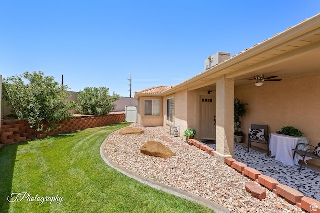 1360 E Telegraph St Unit 18, Washington, UT 84780 - view of green lawn featuring ceiling fan