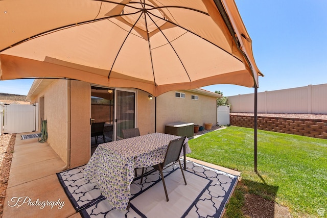 1360 E Telegraph St Unit 18, Washington, UT 84780 - fenced backyard with outdoor dining area and a patio