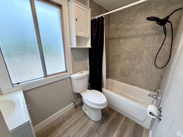 78 N N 3rd St N, Tooele, UT 84074 - bathroom with a textured wall, shower / tub combo with curtain, wood finished floors, and vanity