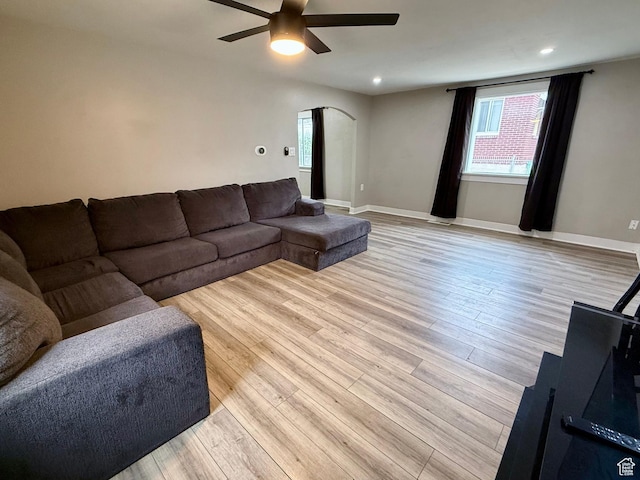 78 N N 3rd St N, Tooele, UT 84074 - living area with arched walkways, a ceiling fan, light wood-type flooring, and recessed lighting